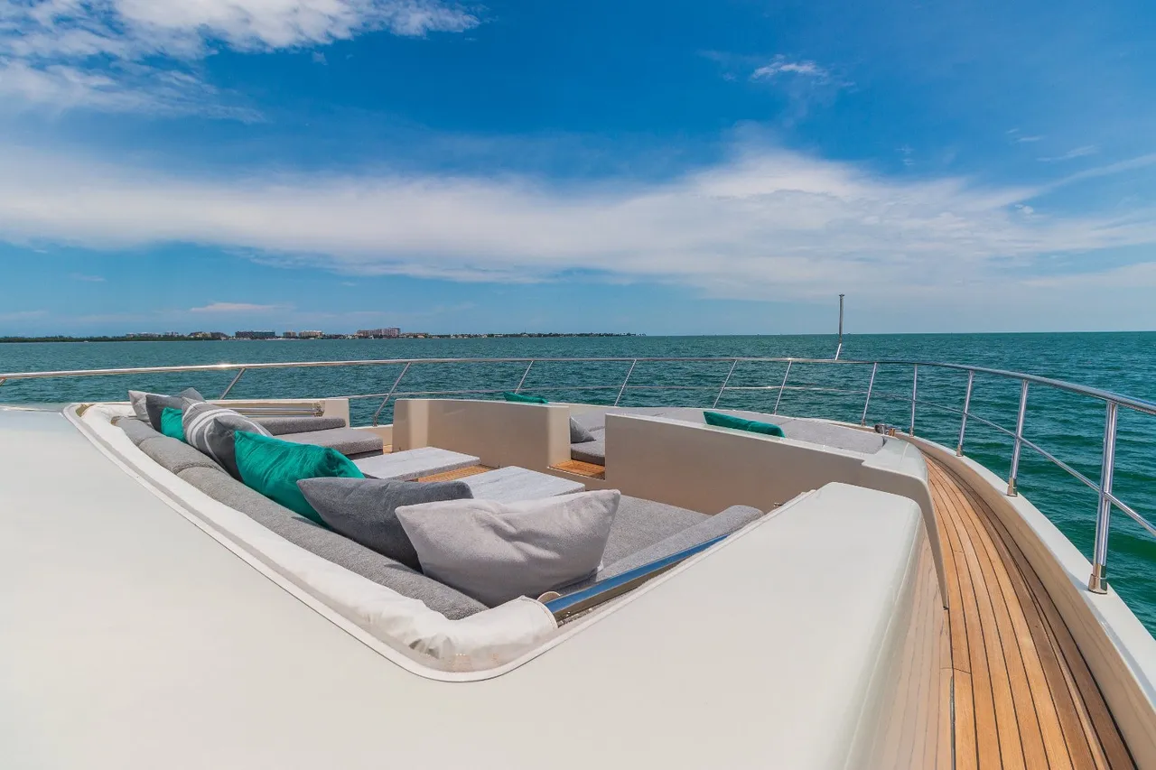 Aerial view of the yacht sailing in turquoise waters