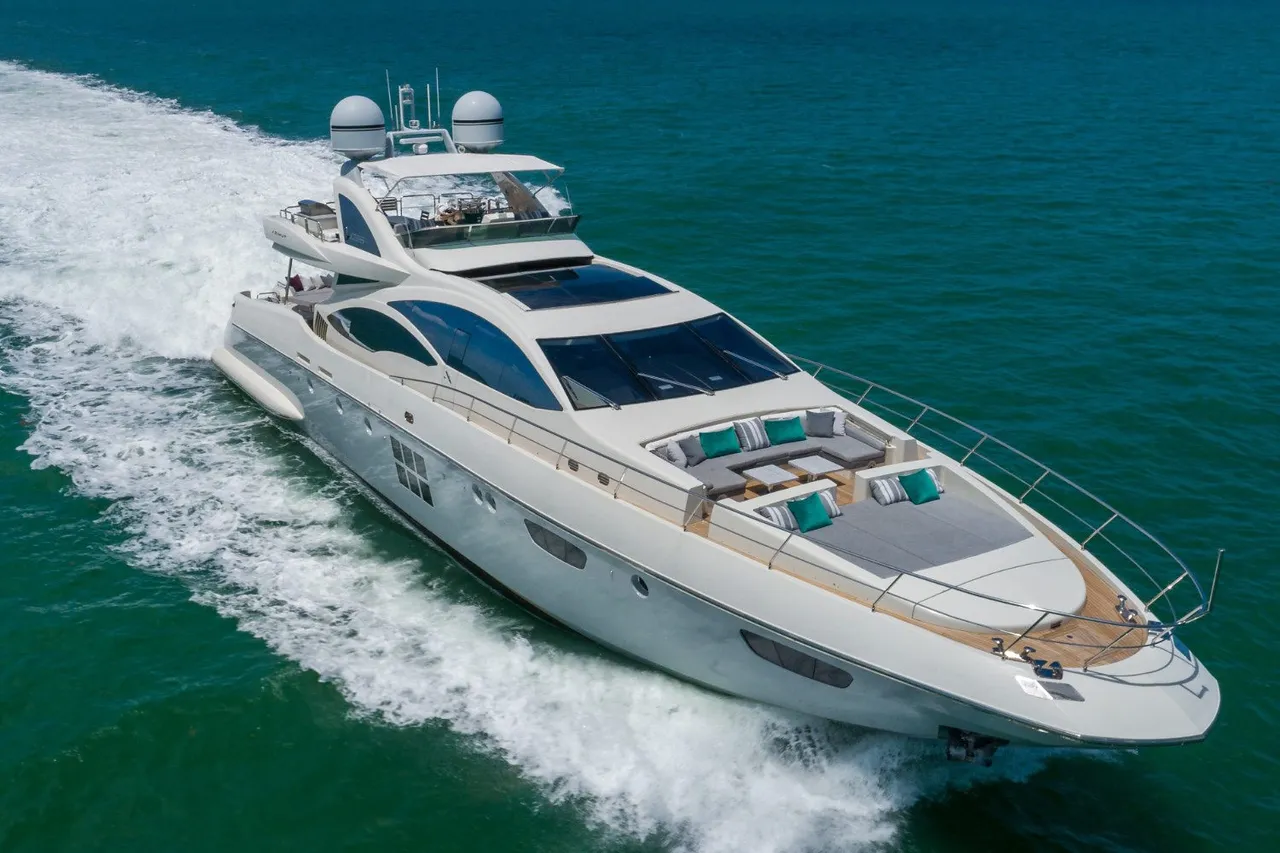 Aerial view of the yacht sailing in turquoise waters